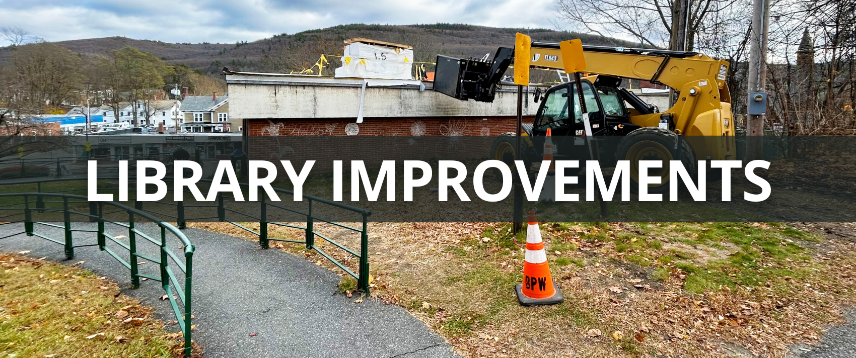 A banner link to the project page for Brooks Memorial Library.